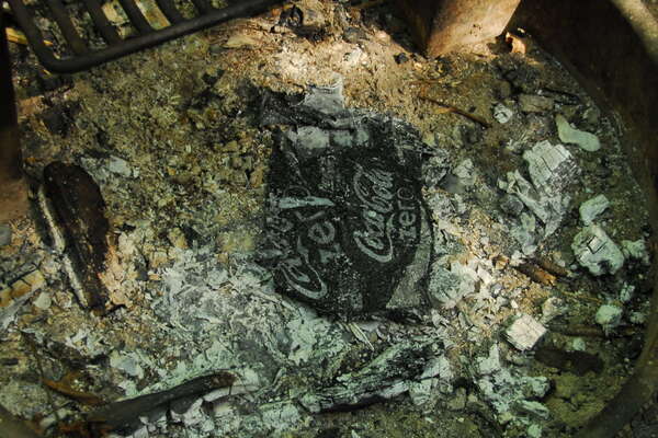 Burned the coke case, but the letters stayed. Just weird